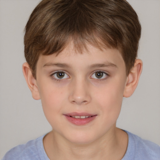 Joyful white child male with short  brown hair and brown eyes