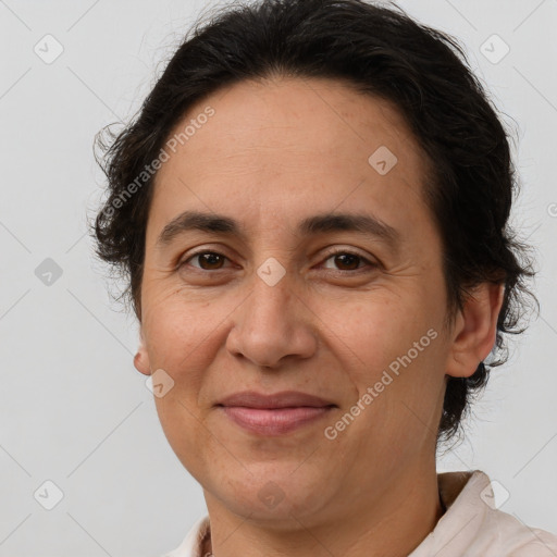 Joyful white adult female with short  brown hair and brown eyes