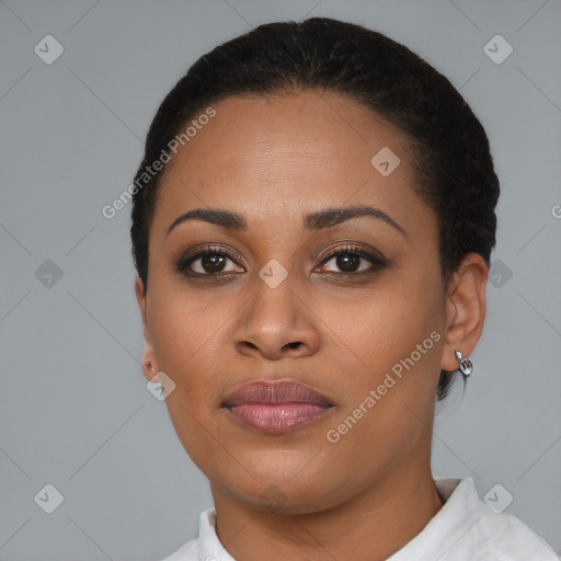 Joyful latino young-adult female with short  brown hair and brown eyes