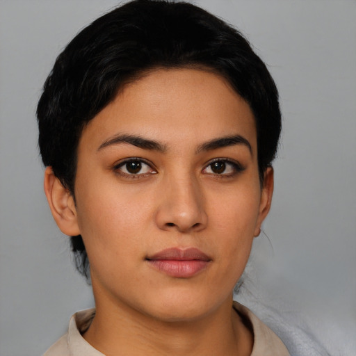 Neutral latino young-adult female with short  brown hair and brown eyes
