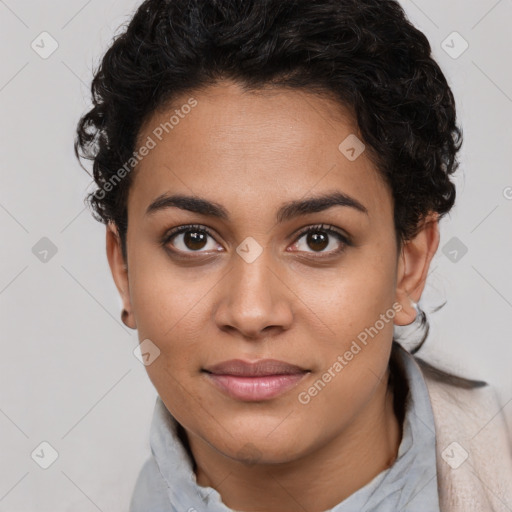 Joyful latino young-adult female with short  brown hair and brown eyes