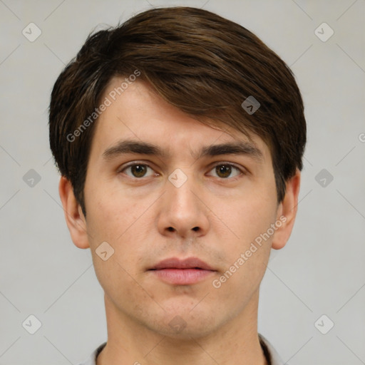 Neutral white young-adult male with short  brown hair and brown eyes