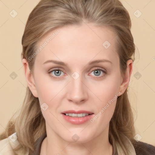 Joyful white young-adult female with long  brown hair and blue eyes