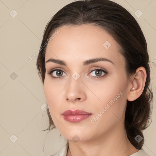 Neutral white young-adult female with medium  brown hair and brown eyes