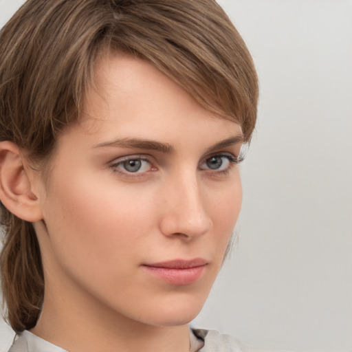 Neutral white young-adult female with medium  brown hair and grey eyes