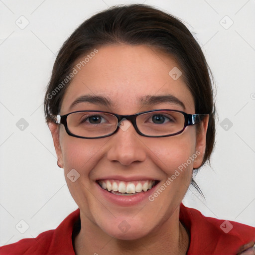 Joyful white young-adult female with medium  brown hair and blue eyes