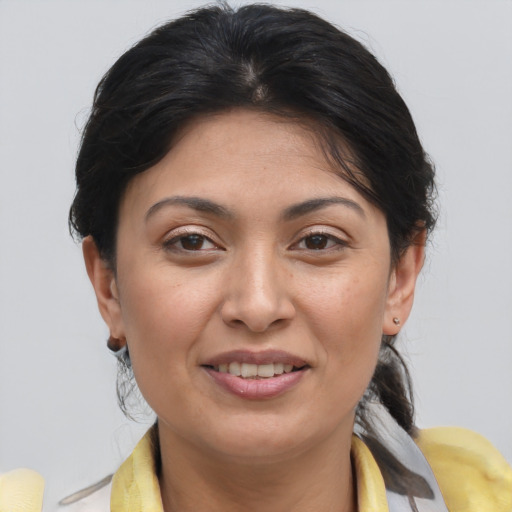 Joyful white young-adult female with medium  brown hair and brown eyes