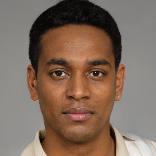 Neutral latino young-adult male with short  black hair and brown eyes