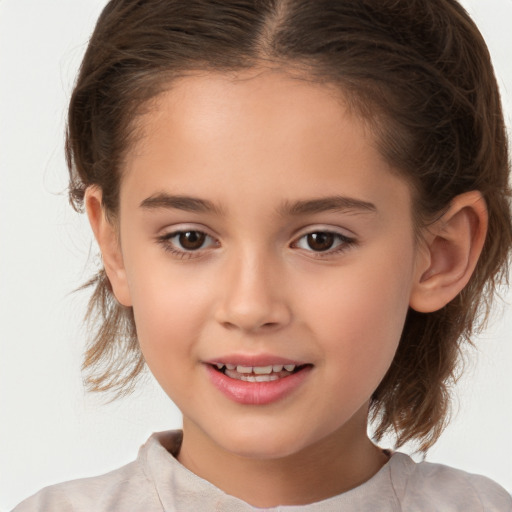 Joyful white child female with medium  brown hair and brown eyes