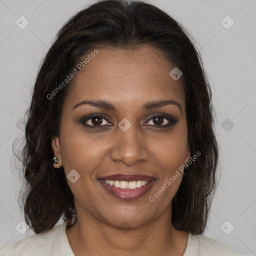 Joyful black young-adult female with medium  brown hair and brown eyes