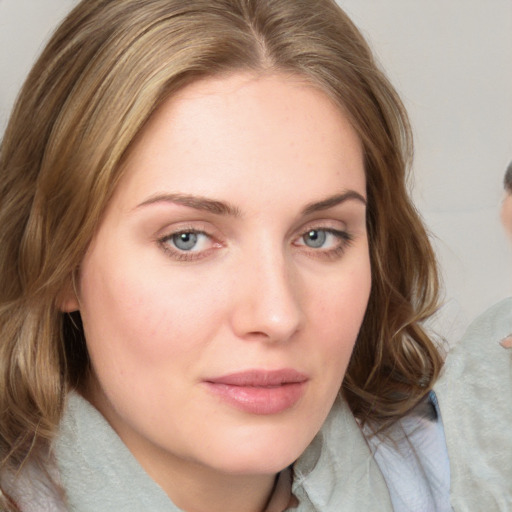 Neutral white young-adult female with medium  brown hair and blue eyes