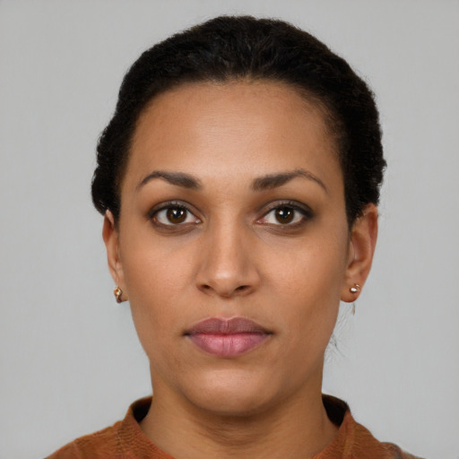Neutral latino young-adult female with short  brown hair and brown eyes