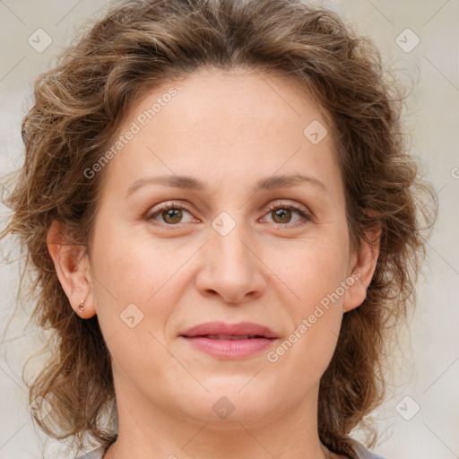 Joyful white young-adult female with medium  brown hair and green eyes