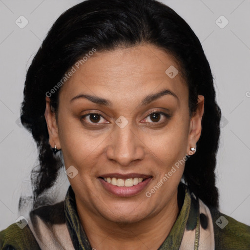 Joyful latino adult female with medium  brown hair and brown eyes