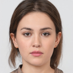 Neutral white young-adult female with medium  brown hair and brown eyes