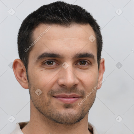 Joyful white young-adult male with short  brown hair and brown eyes