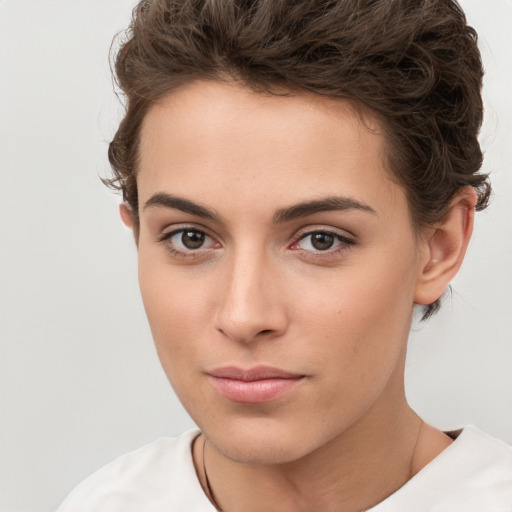 Neutral white young-adult female with short  brown hair and brown eyes