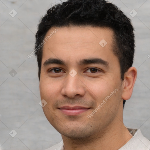 Joyful white young-adult male with short  black hair and brown eyes