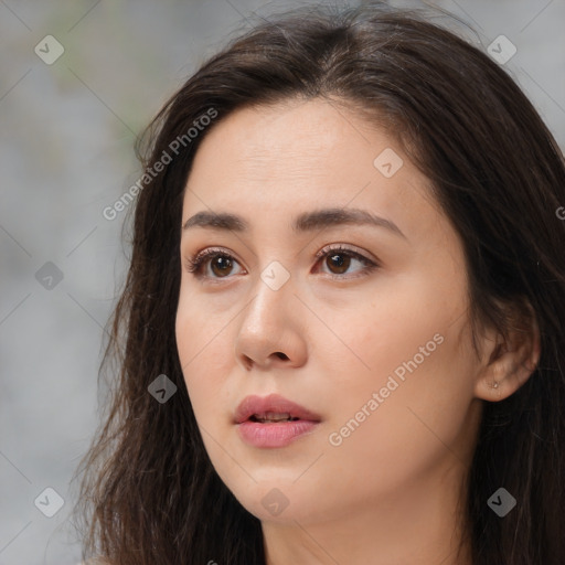 Neutral white young-adult female with long  brown hair and brown eyes