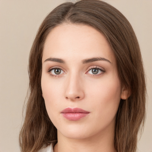 Neutral white young-adult female with long  brown hair and brown eyes