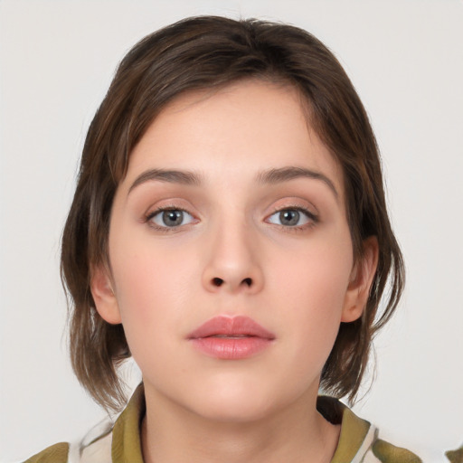 Neutral white young-adult female with medium  brown hair and brown eyes