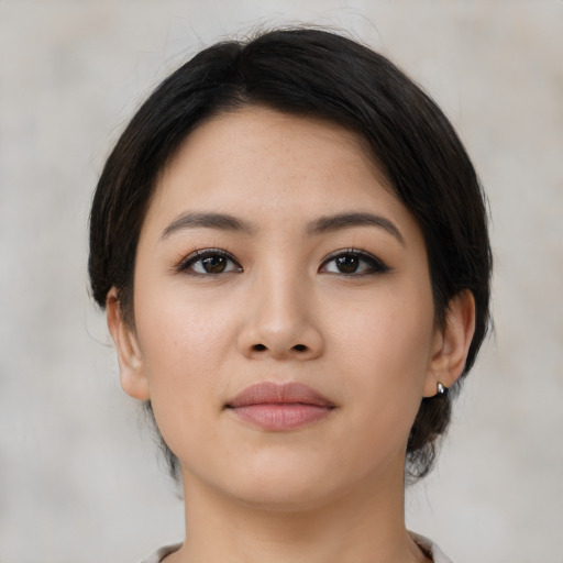Neutral latino young-adult female with medium  black hair and brown eyes