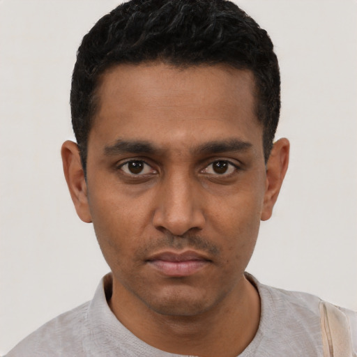 Neutral black young-adult male with short  black hair and brown eyes