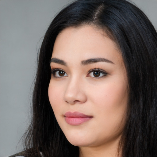 Neutral latino young-adult female with long  black hair and brown eyes
