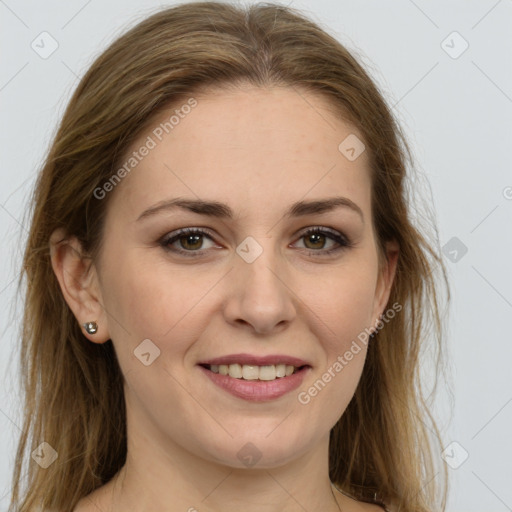 Joyful white young-adult female with long  brown hair and green eyes