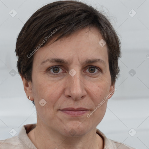 Joyful white adult female with short  brown hair and brown eyes