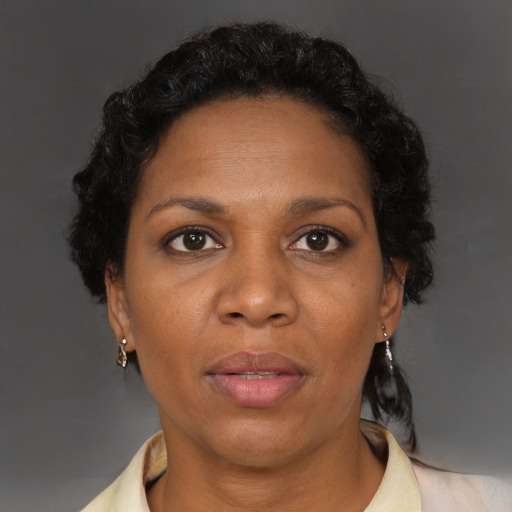 Neutral black adult female with short  brown hair and brown eyes