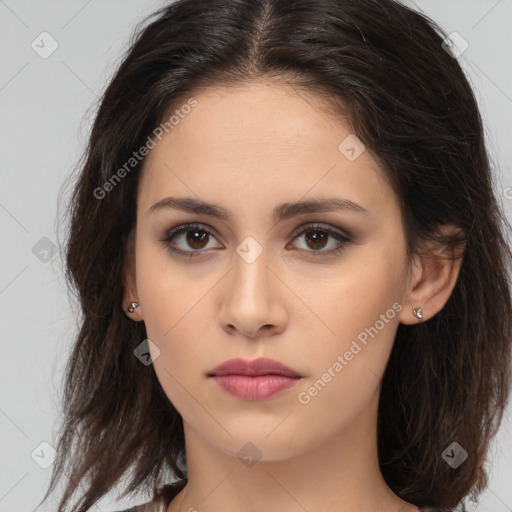 Neutral white young-adult female with long  brown hair and brown eyes