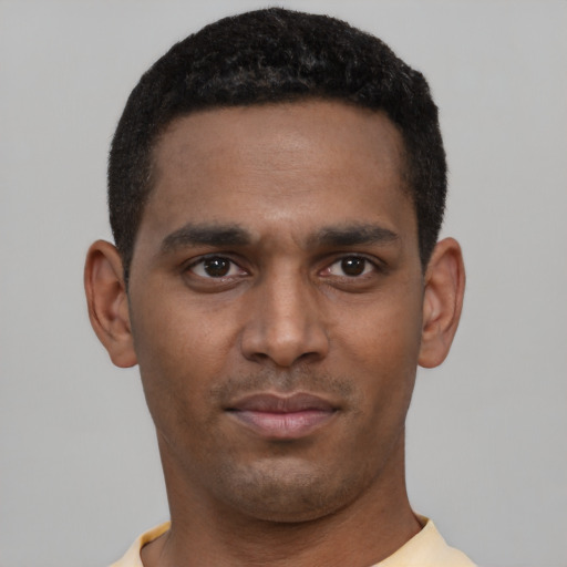 Neutral black young-adult male with short  black hair and brown eyes