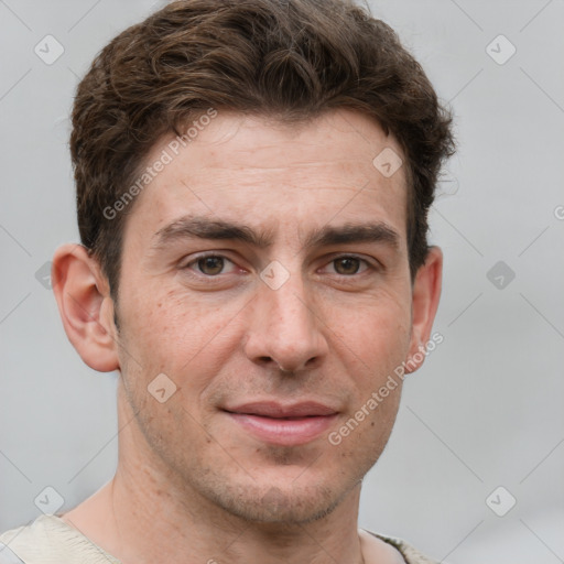 Joyful white adult male with short  brown hair and grey eyes