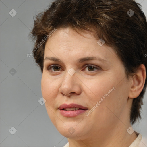 Joyful white adult female with short  brown hair and brown eyes