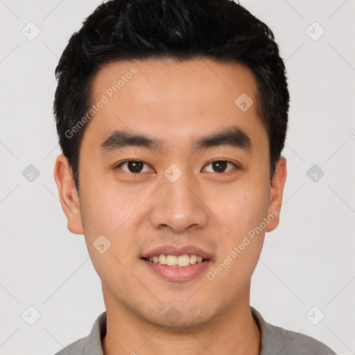 Joyful white young-adult male with short  black hair and brown eyes