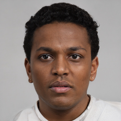 Neutral black young-adult male with short  black hair and brown eyes