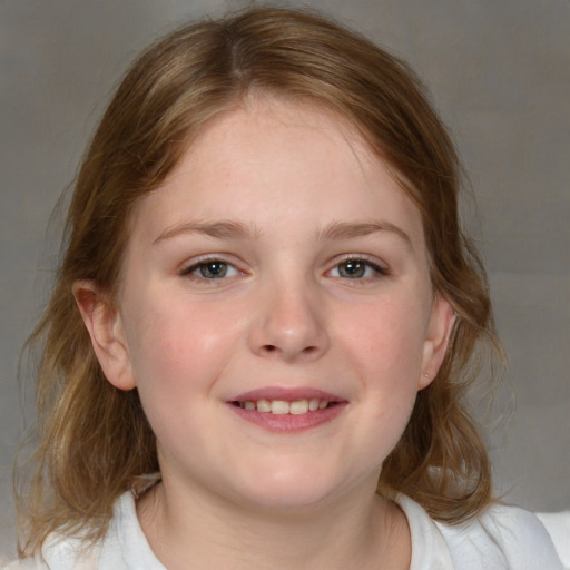 Joyful white child female with medium  brown hair and blue eyes