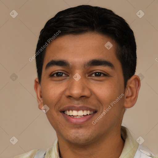 Joyful latino young-adult male with short  black hair and brown eyes