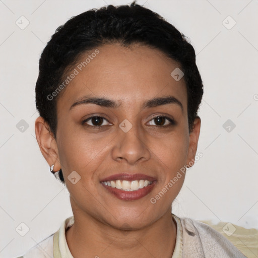 Joyful latino young-adult female with short  black hair and brown eyes