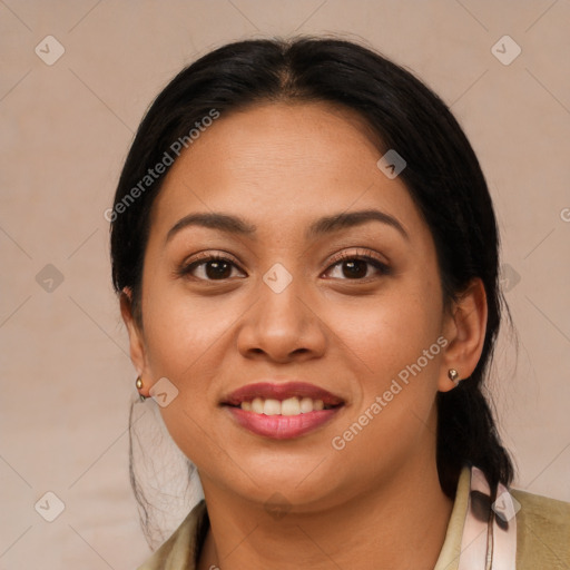 Joyful latino young-adult female with medium  black hair and brown eyes