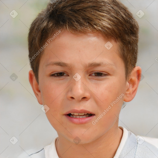 Joyful white child male with short  brown hair and brown eyes