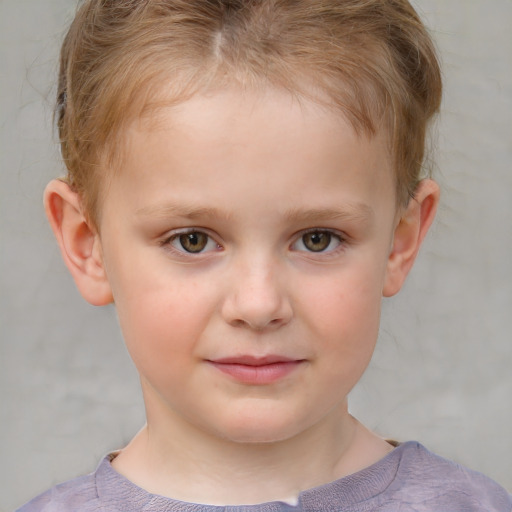 Joyful white child female with short  brown hair and grey eyes