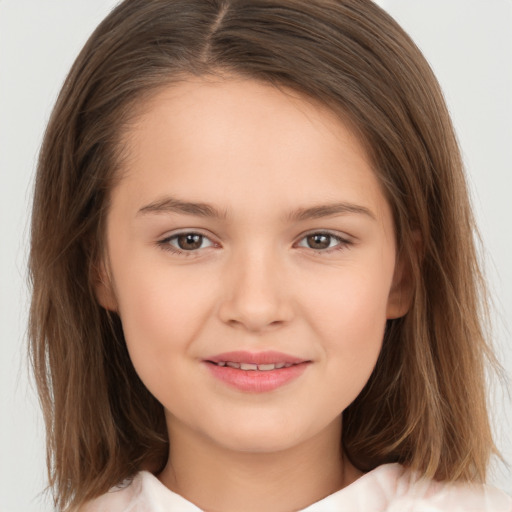 Joyful white child female with medium  brown hair and brown eyes