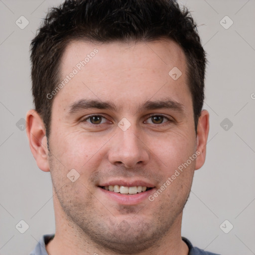 Joyful white young-adult male with short  brown hair and brown eyes