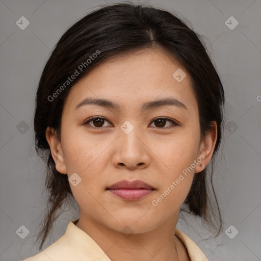 Joyful asian young-adult female with medium  brown hair and brown eyes