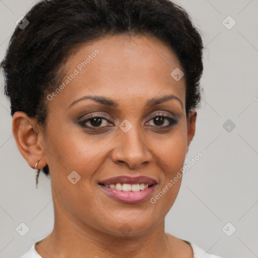 Joyful latino young-adult female with short  brown hair and brown eyes