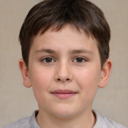 Joyful white child male with short  brown hair and brown eyes