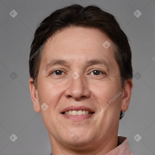 Joyful white adult male with short  brown hair and brown eyes