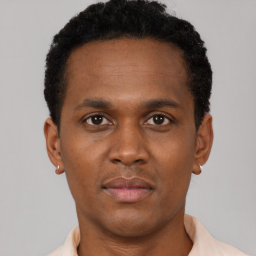Neutral black young-adult male with short  brown hair and brown eyes